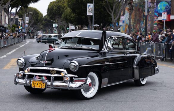 black chevrolet at a car show